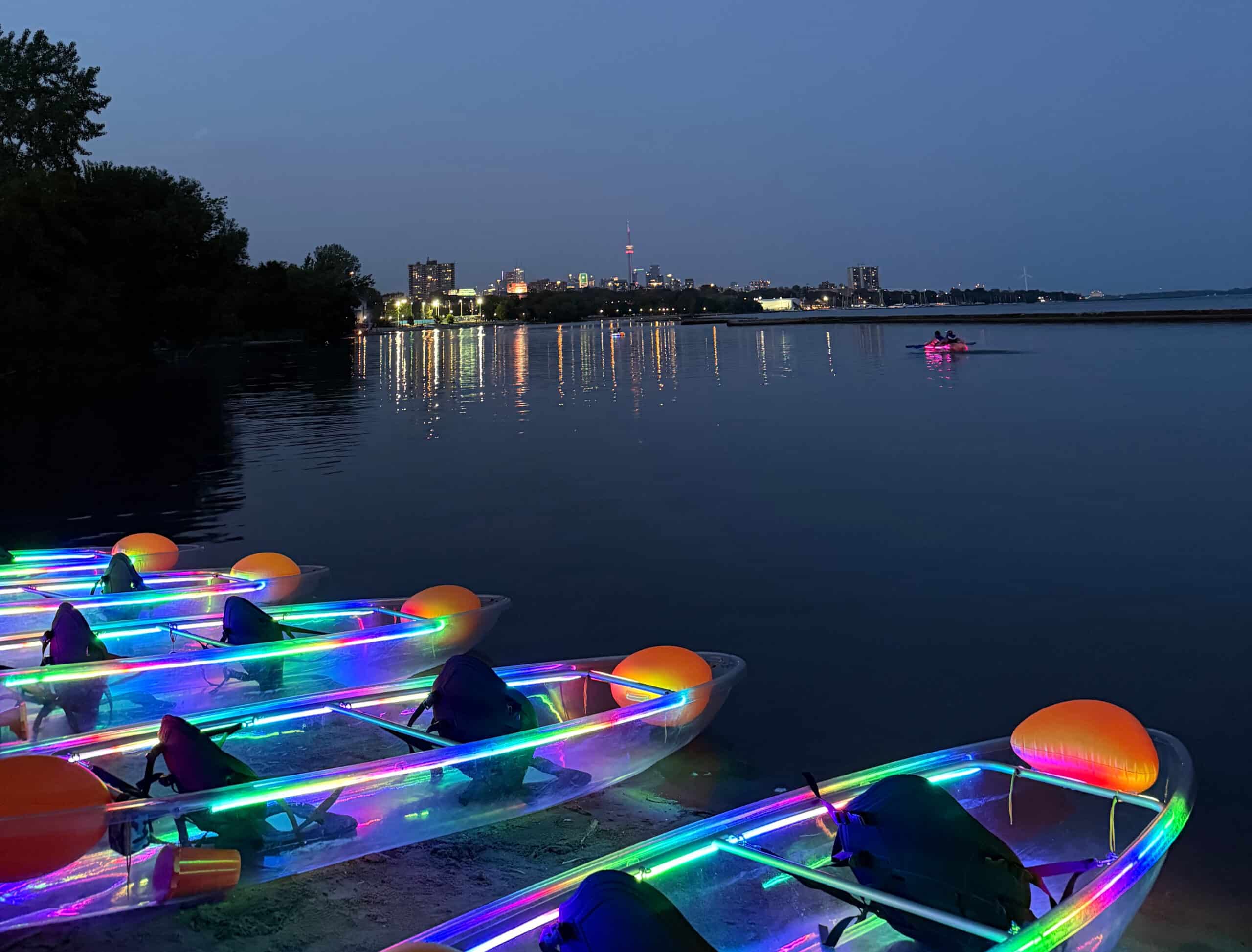 Glow in the dark kayaking Toronto summer bucket list 2026 CN Tower skyline Lake Ontario